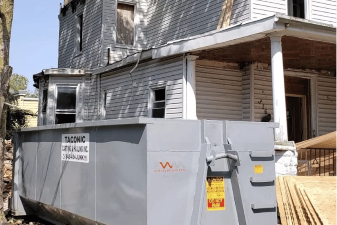 overflowing commercial dumpster