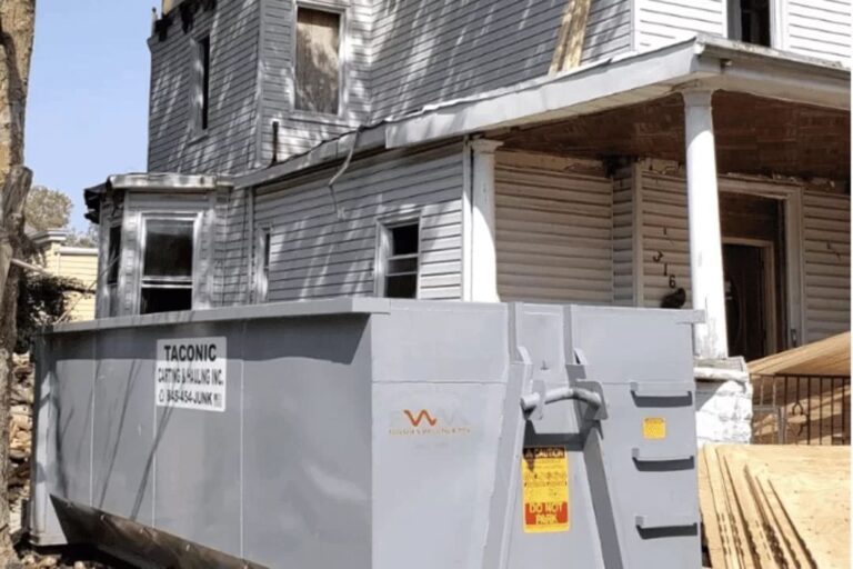 job site cleanup with construction dumpster for renovation and demolition waste