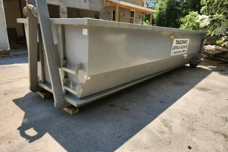 roll-off dumpster used for construction waste removal at building project